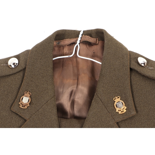 63 - A WWII British Army Officer's khaki uniform, the cap with Royal Corp Army Ordnance badge; together w... 