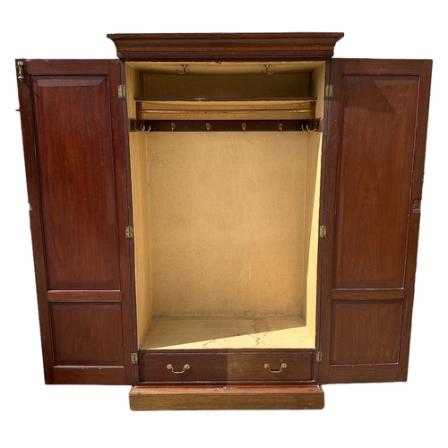 837 - An Edwardian inlaid mahogany wardrobe, 118cms wide.