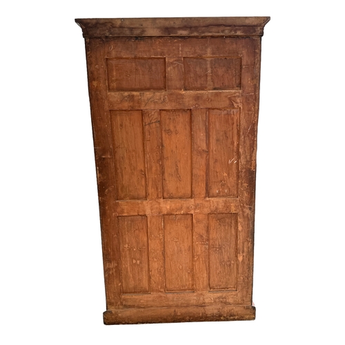 837 - An Edwardian inlaid mahogany wardrobe, 118cms wide.