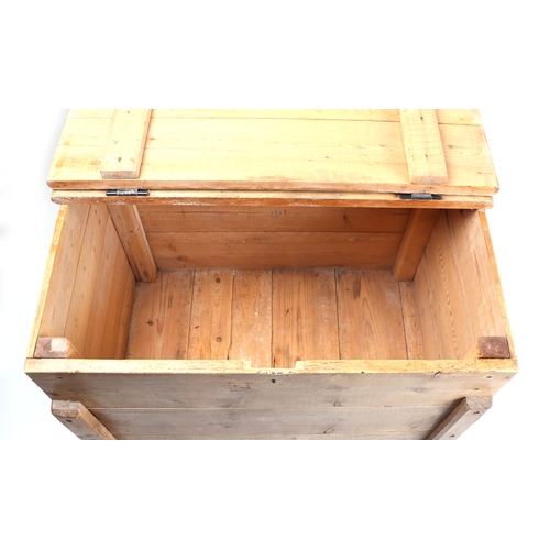 906 - A French pine flour bin with hinged lid and stile feet, 77cms wide.