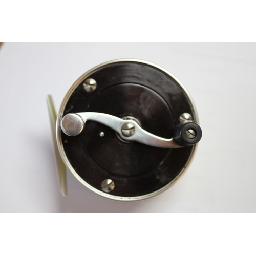 335 - A group of fly fishing wheels to include a JW Young & Sons Masterline DT10SF; a Gladding Intrepid; a... 