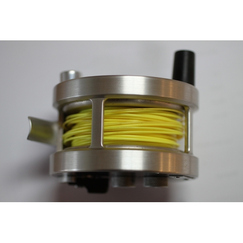 335 - A group of fly fishing wheels to include a JW Young & Sons Masterline DT10SF; a Gladding Intrepid; a... 