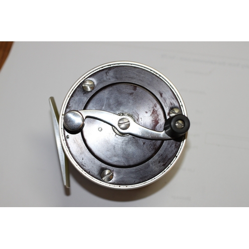 335 - A group of fly fishing wheels to include a JW Young & Sons Masterline DT10SF; a Gladding Intrepid; a... 