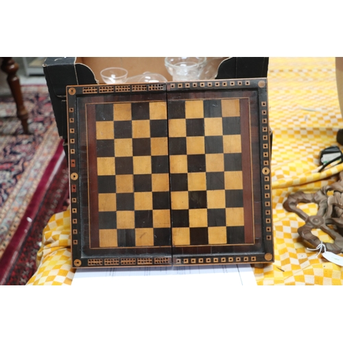 349 - A 19th century combination chess, cribbage and backgammon box; together with a set of bone dominoes,... 