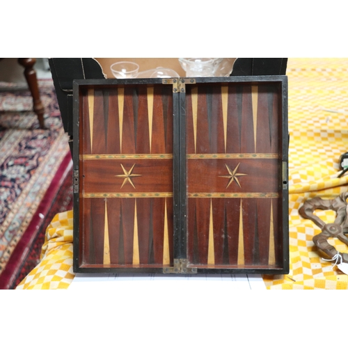 349 - A 19th century combination chess, cribbage and backgammon box; together with a set of bone dominoes,... 