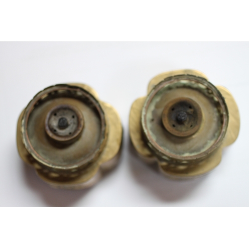 719 - Two Chinese brass opium lamps, 10cm high (2).