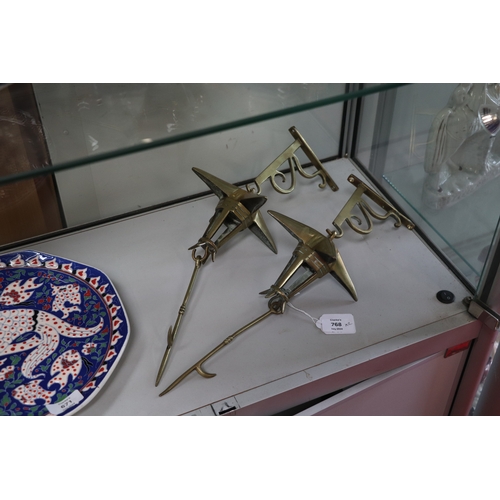 768 - A pair of 19th century brass whale oil lamps with hanging brackets, approx 18ins long overall (2).