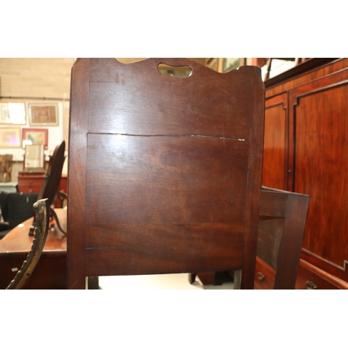 803 - A Georgian mahogany commode night stand, the twin handled galleried top above a cupboard with pull-o... 