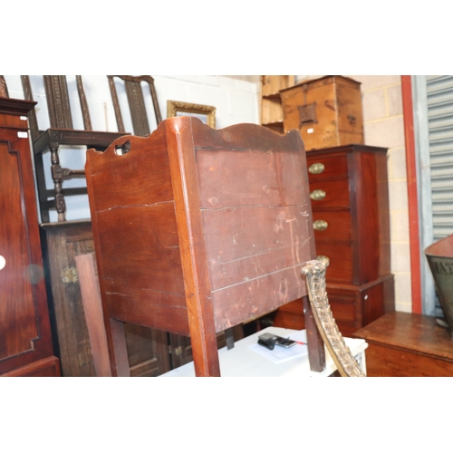 803 - A Georgian mahogany commode night stand, the twin handled galleried top above a cupboard with pull-o... 