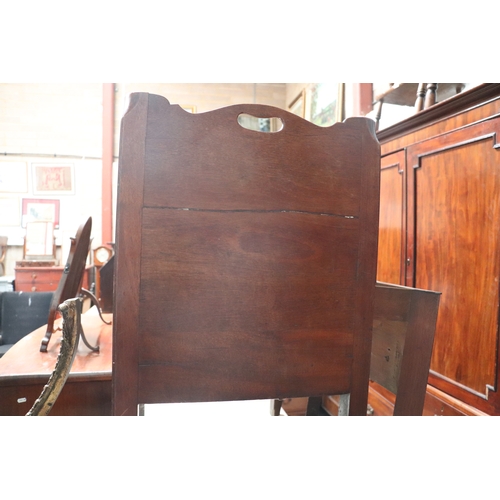 803 - A Georgian mahogany commode night stand, the twin handled galleried top above a cupboard with pull-o... 