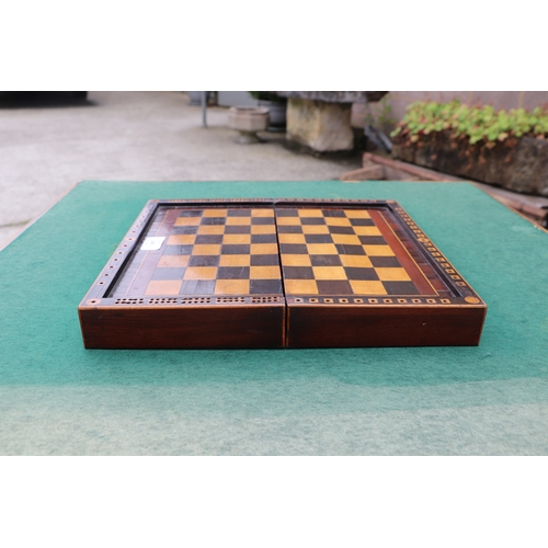 349 - A 19th century combination chess, cribbage and backgammon box; together with a set of bone dominoes,... 