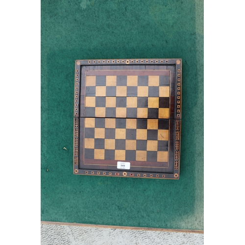 349 - A 19th century combination chess, cribbage and backgammon box; together with a set of bone dominoes,... 