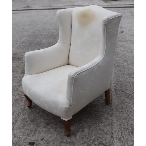 847 - A pair of George III style wingback upholstered armchairs on cabriole front legs (2).