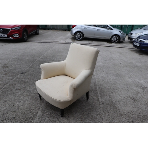 848 - A pair of Victorian upholstered armchairs on ebonised turned front legs (2).