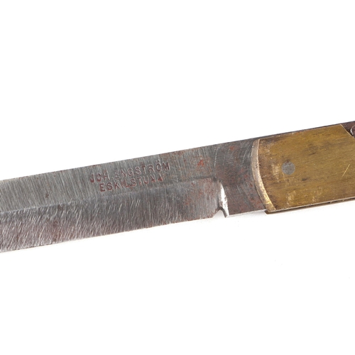 17 - Two Swedish barrel knives, the largest 14.5cms closed; together with a Golsen knife (3).