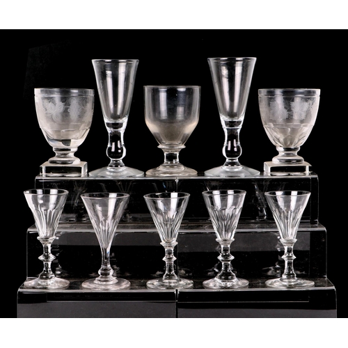 216 - A quantity of 19th century wine glasses and rummers to include etched examples.