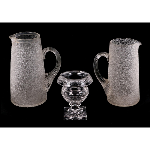 218 - A pair of Victorian glass decanters; together with other decanters; cut glass jugs and other items.