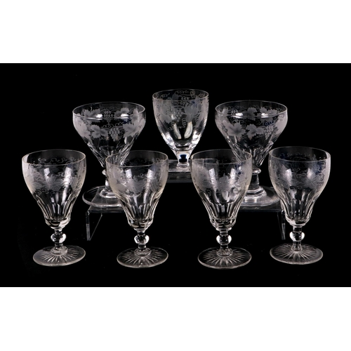 220 - A part suite of etched glassware to include rummers with grape & vine engraved decoration, other win... 