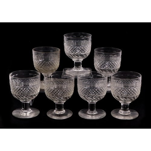 222 - A set of seven early 19th century cut glass rummers with hobnail decoration; together with another s... 