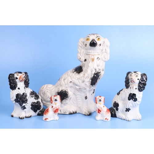 237 - Four pairs of Staffordshire pottery spaniels; together with a large single Staffordshire spaniel, th... 