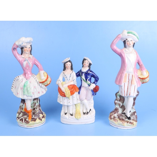 238 - A group of 19th century Staffordshire figures and groups, the largest 26cms high (7).