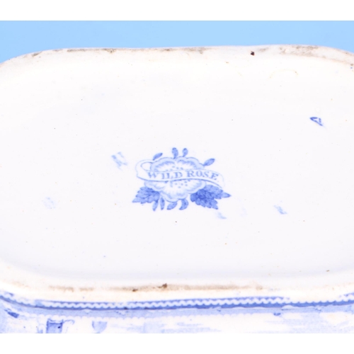 242 - A blue & white Wild Rose pattern tureen and cover on associated stand, 27cms wide.