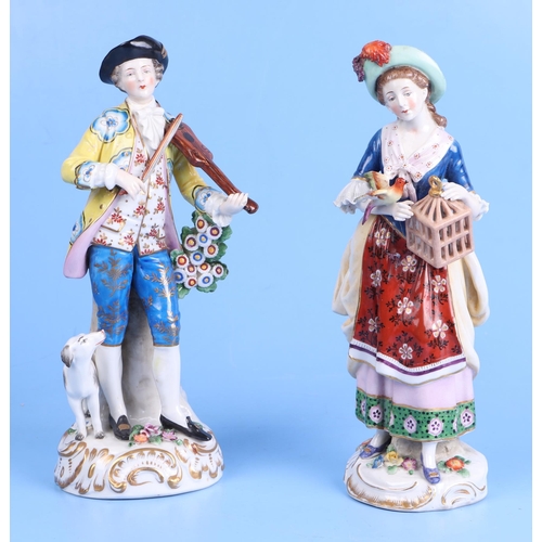 245 - A group of Chelsea style figures; together with a similar group depicting a young couple with a musi... 