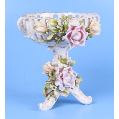 251 - A Meissen style oil lamp base (converted to a table lamp) decorated in relief with roses and having ... 