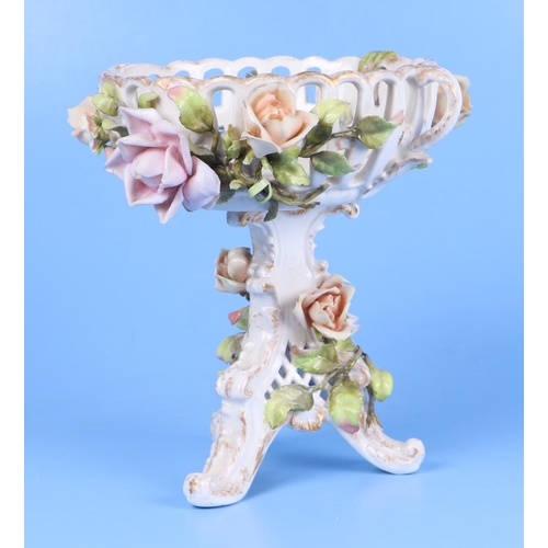 251 - A Meissen style oil lamp base (converted to a table lamp) decorated in relief with roses and having ... 