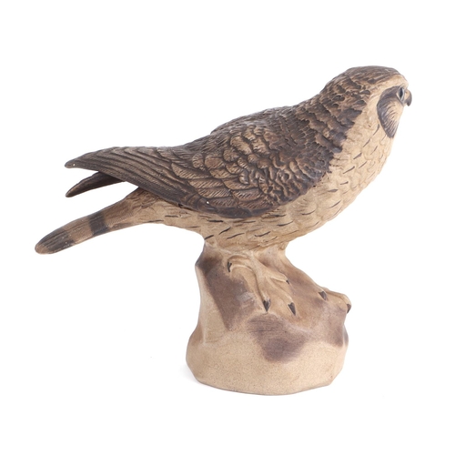 255 - A Poole Pottery stoneware Kestrel / Merlin bird of prey figure, impressed signature to base 'B Linle... 