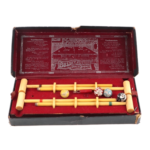 285 - A vintage Bussey's table croquet set, boxed.