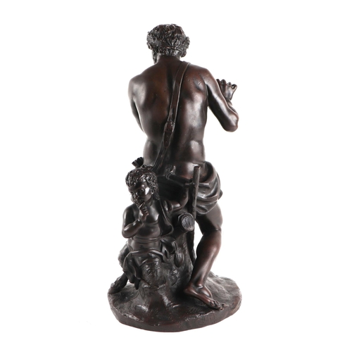 306 - After Coustou, a bronze group depicting Pan and a faun, 38cm high.Condition ReportPan is missing his... 