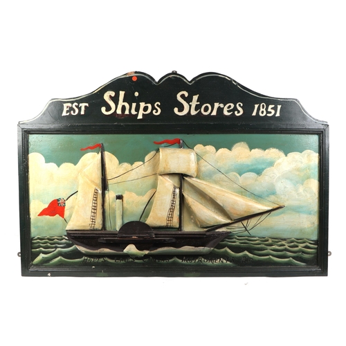 319 - A 3D painted wooden sign 'Ship's Stores' depicting a two-masted paddle steamer, 91cms wide.