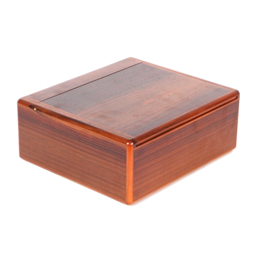 320 - An Elie Bleu French walnut humidor, 24cms wide.