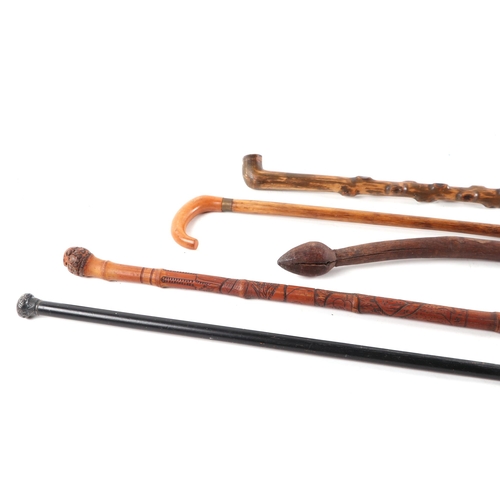 333 - A small collection of shooting and walking sticks to include horn handled examples (9).