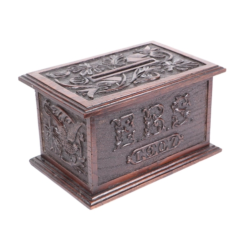 344 - An early 20th century carved oak country house letters box, initialled 'EBS' and dated 1907, 32cms w... 