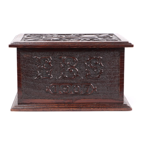 344 - An early 20th century carved oak country house letters box, initialled 'EBS' and dated 1907, 32cms w... 