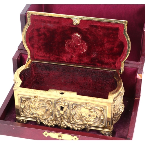 345 - A Victorian gilt brass casket commemorating Queen Victoria's Diamond Jubilee 1897, cast in high reli... 