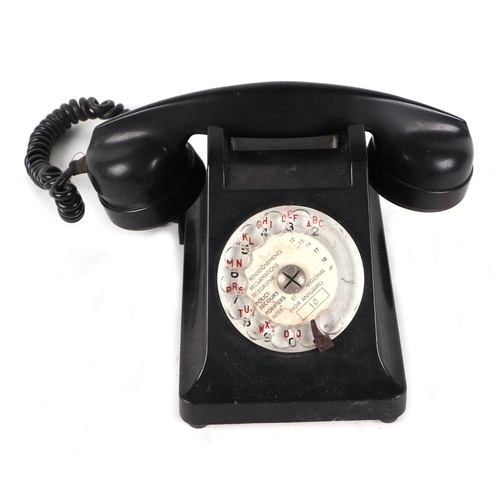 362 - A French PTT black Bakelite rotary dial telephone.