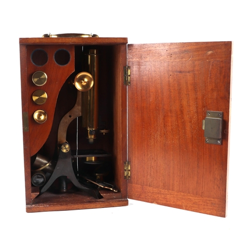 372 - A late Victorian W. F. Stanley London lacquered brass monocular microscope with a selection of lense... 