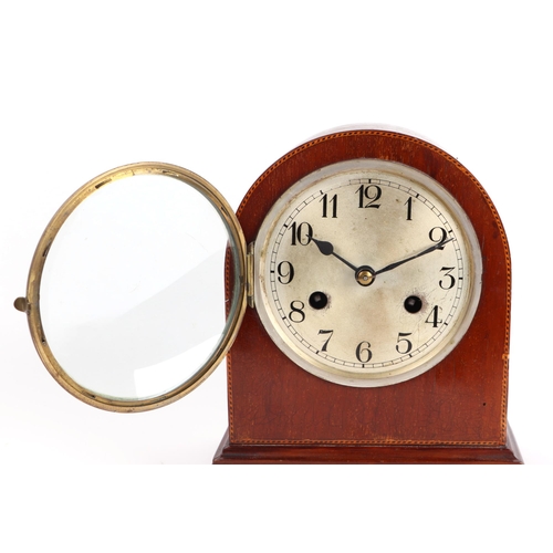 380 - An Edwardian dome topped mantle clock, the silvered dial with Arabic numerals and fitted with an 8-d... 