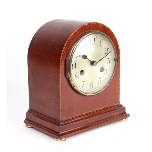 380 - An Edwardian dome topped mantle clock, the silvered dial with Arabic numerals and fitted with an 8-d... 