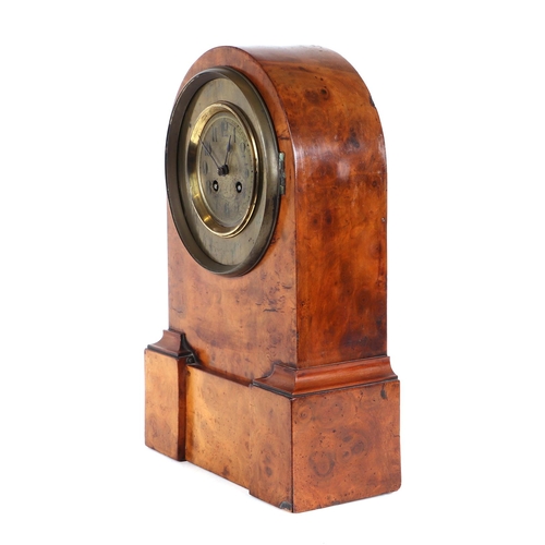 384 - An early 20th century mantle clock, the brushed brass dial with Arabic numerals and fitted with an 8... 