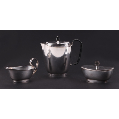 404 - A Swedish mid century modern silver plated three-piece tea service comprising teapot and cover, sucr... 