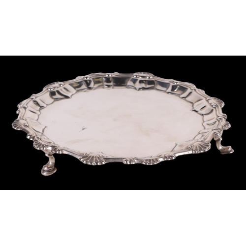 405 - A George III silver waiter, London 1766 and maker's mark for Ebenezer Coker, 17cms diameter, 217g.