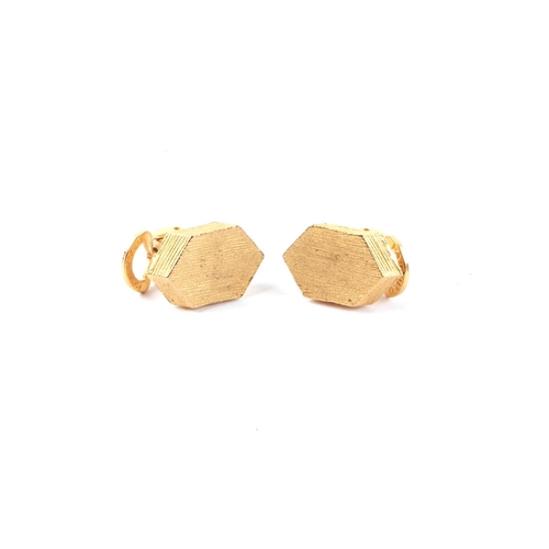 462 - A pair of Gold Tone clip earrings in a Liberty of London leather case.