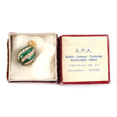 471 - A miniature Russian yellow metal mounted enamel egg pendant.