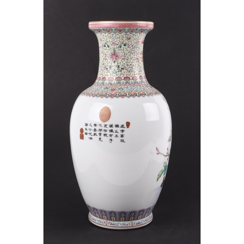 512 - A Chinese Republic style baluster vase decorated with peacocks and calligraphy, 35cms high.