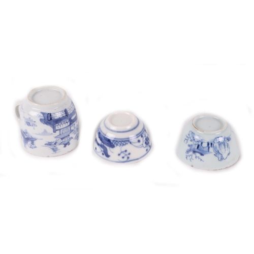 535 - A quantity of assorted Chinese and Japanese blue & white ceramics to include two bowls, cups, a pill... 