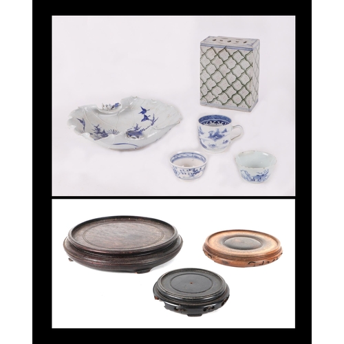 535 - A quantity of assorted Chinese and Japanese blue & white ceramics to include two bowls, cups, a pill... 